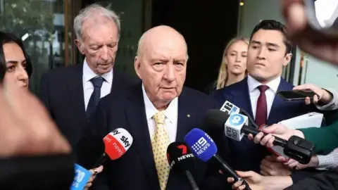 Sex Abuse Charges Involving Top Australian Media Personality Reduced